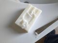 Level the surface inside the marking plus a couple millimeters outside with a spoon. (Soap shaving should be saved)
